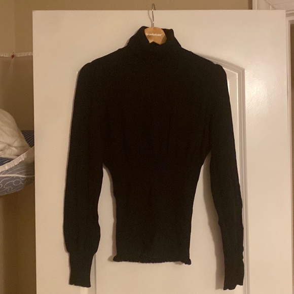 Unique black turtleneck with smoked waist and blouson sleeves - Picture 1 of 2